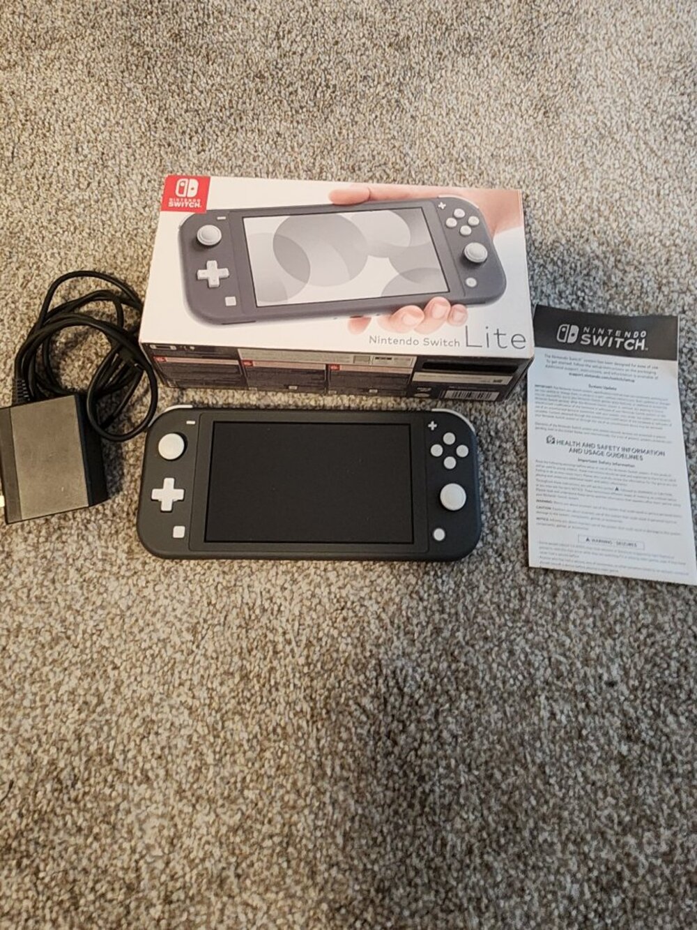 Nintendo Switch Light - Gray. Original packaging included!